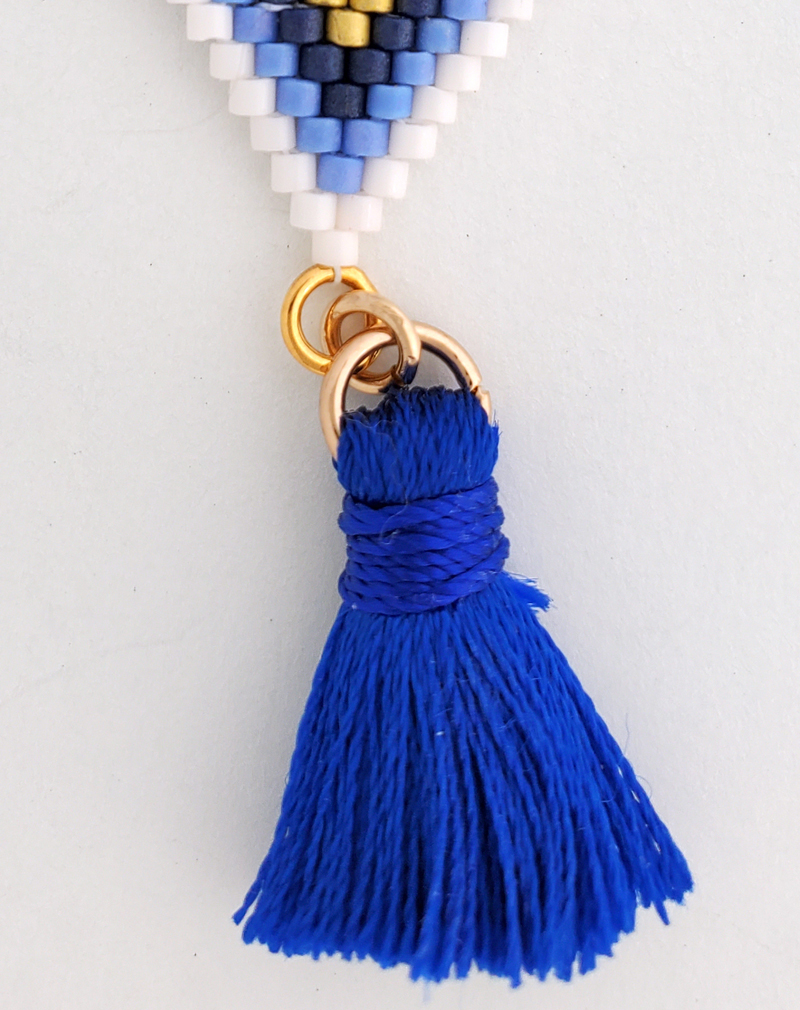 Attach Tassel to Let Love Rule Pendant